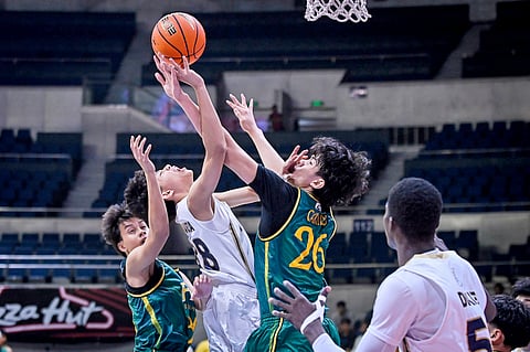 DAVID Sabareza delivers a spectacular performance to lift the NU Bullpups to a 79-49 win over the FEU-D Baby Tamaraws in Game 1 of their UAAP junior high school basketball best-of-three finals series on Saturday at the Smart Araneta Coliseum.