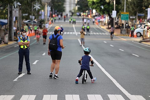 QCitizens and fitness enthusiasts from nearby communities enjoy car-free Sunday mornings for recreational activities with friends and family at Tomas Morato in Quezon City.