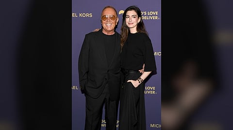 ANNE Hathaway and Michael Kors