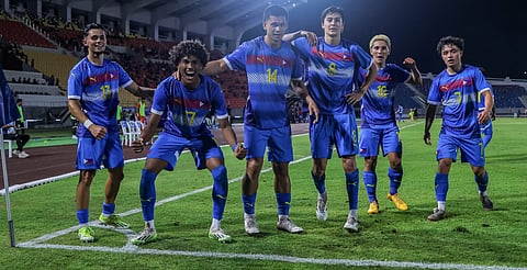 TEAM Philippines celebrates after beating Indonesia, 1-0, to end 34 years of heartbreaks in the men’s U22 football event of the 33rd Southeast Asian Games.
