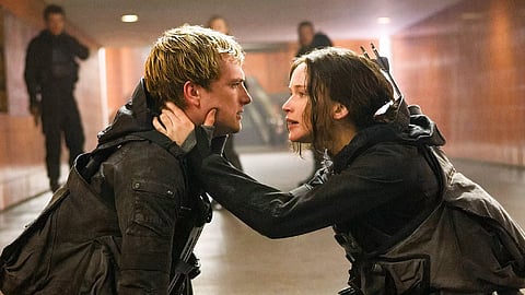 Jennifer Lawrence’s Katniss Everdeen and Josh Hutcherson’s Peeta Mellark in a pivotal scene from The Hunger Games: Mockingjay – Part 2, the final chapter of the original trilogy released in 2015. — Lionsgate
