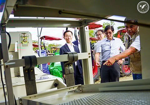 President Ferdinand R. Marcos Jr., KAMICO Chair Shin Gil Kim, and Ambassador Sang-Hwa Lee check the machineries during the groundbreaking of the Korea Agricultural Machinery Industry Complex (KAMIC) at Brgy. Kalikid Sur in Cabanatuan City, Nueva Ecija on December 10, 2025.