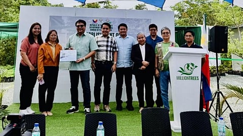 TREES Foundation president Melandrew Velasco officially receives from BPI assistant director Herminigilda Gabertan the Bureau of Plant Industry’s Indoor Cultivation System turnover certificate to the foundation at the Million Trees Nursery and Eco Learning Center at the La Mesa Watershed in Quezon City. In photo ( from left ): BPI chief for engineering Elaiza Nicole Dotimas, assistant director Gabertan, MTFI president Mel Velasco, Rotary DGE Rhyan Virrey, QC Barangay Greater Lagro captain Leo Garra, QC Joy of Urban Farming chief Cristina Perez, MWSS deputy administrator Ryan Ayson and Maynilad vp Roel Espiritu.