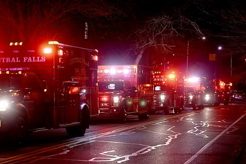 Ambulances line Hope Street at Brown University in Providence, R.I., Saturday, Dec. 13, 2025, during reports of a shooting.