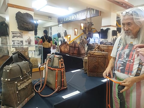 NATIONAL Artist Eric ‘Kidlat Tahimik’ de Guia marvels at the ingenuity behind the traditional ‘pasiking’ — an indigenous backpack crafted from recycled conveyor belts used in the gold mines of the Cordillera.