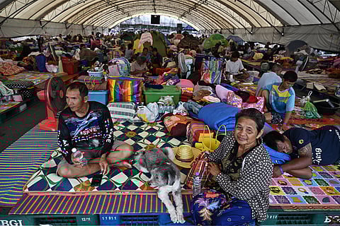 DISPLACED residents rest at an evacuation center at Chang International Circuit in the Thai border province of Buriram on 13 December 2025, amid military clashes along the Cambodia-Thailand border.