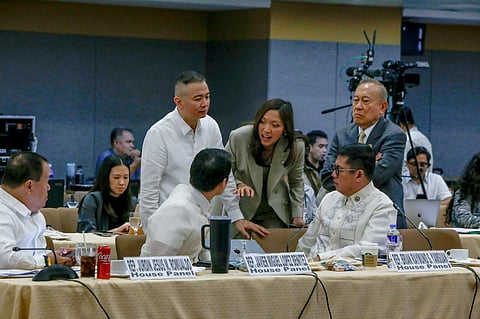 LAWMAKERS huddle during high-stakes talks on the 2026 national budget as Representatives (clockwise, from left) Javier Benitez, Albert Garcia, Mikaela Suansing, Jose Alvarez and Brian Yamsuan confer at the Bicameral Conference Committee, where final decisions on spending priorities and contested budget items are being ironed out.