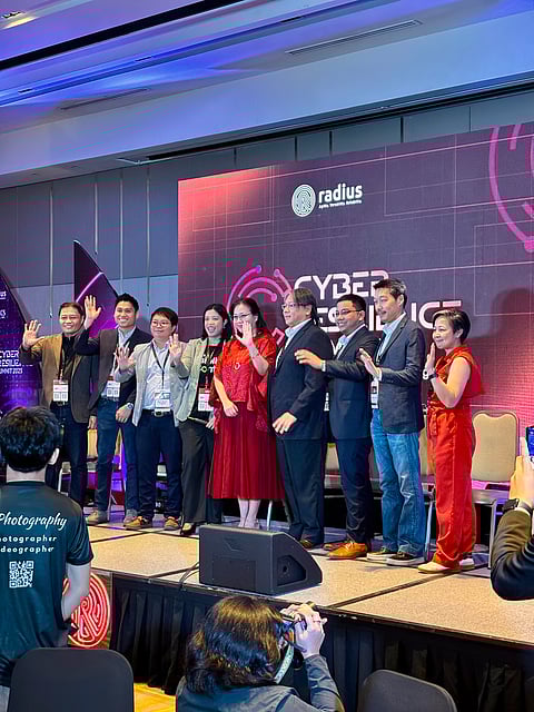 RADIUS president and CEO Exequiel Delgado (leftmost), Meralco VP and chief information security officer Marilene Tayag (fifth from left), VST-ECS Philippines general manager for Strategic Business Arlene Singzon (rightmost), and panelists from iboss, Rubrik, Forcepoint, Cisco, Menlo Security and Fortinet come together during the inaugural Radius Cyber Resilience Summit 2025 at Seda BGC.