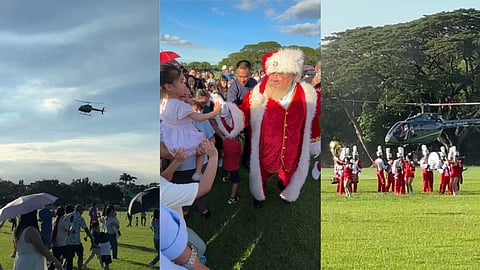 Santa makes a dramatic landing at Alabang Country Club, stepping out of a Bell 505 helicopter to greet eager children on the polo field. | Alvin Kasiban