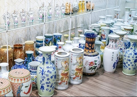 AN array of vintage Chinese vases showcasing diverse forms and motifs.