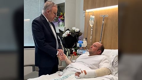 ALBANESE (left) meets Ahmed al Ahmed, the man who disarmed one of the attackers during the Bondi Beach attack, in hospital in Sydney. Australia’s prime minister visited Bondi Beach shooting hero Ahmed al Ahmed in hospital, lauding his efforts to help stop the nation’s deadliest gun attack in decades.
