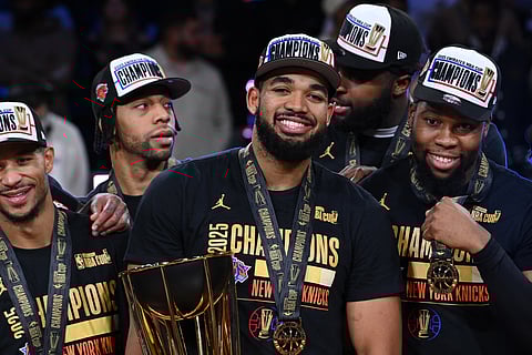 Karl-Anthony Towns #32 of the New York Knicks poses with the 2025 Emirates NBA Cup Championship Trophy after winning against the San Antonio Spurs during the 2025 NBA Emirates Cup Final on December 16, 2025 at T-Mobile Arena in Las Vegas, Nevada.