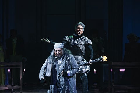 ARNEL Carreon as Ebenezer Scrooge with Franco Laurel as The Ghost of Christmas Past in 9Works Theatrical’s ‘A Christmas Carol.’
