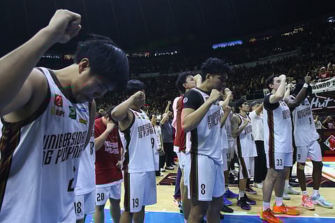 THE UP Fighting Maroons go down fighting against La Salle in their failed bid to retain the UAAP basketball title.