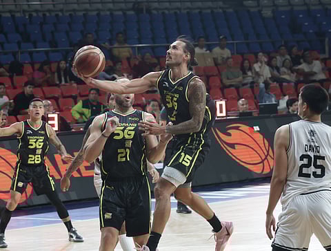 JORDAN Heading of TNT soars for a layup during their PBA Philippine Cup game against Blackwater on Friday. The Tropang 5G prevailed, 113-96.