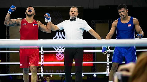 EUMIR Marcial refuses to let Filipino boxers go home empty-handed as he clinched the gold medal in the men’s 80kg boxing event of the 33rd Southeast Asian Games.