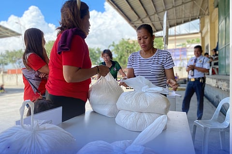 LOCAL residents line up at the NFA Compound in the North Reclamation Area to buy high-quality rice at just P20 per kilo. The initiative, managed by the NFA and supported by the DA and FTI, fulfills President Ferdinand Marcos Jr.’s promise to make rice more affordable for Filipino families.