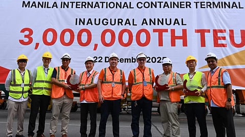 MICT caps off 2025 with three million TEU milestone. Posing for posterity during the ceremonial handling of the terminal’s three millionth TEU container are (from left) Frank Domogoma and John Wu of Evergreen; Roberto Agustin and Alan Surposa of URC; Christian Lozano, MICT chief executive officer; Jose Carlo Javier, MICT terminal director; Capt. Melecio Pascua, Ever Bliss vessel master; and Bryan Kuo and Jesus Gomez of Evergreen.