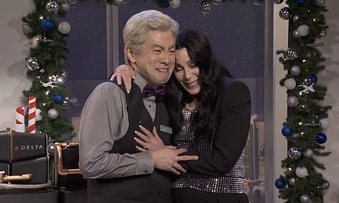 Bowen Yang and Cher share a heartfelt moment during Yang’s final Saturday Night Live episode. | NBC