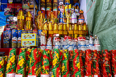 SHOPPERS browse firecrackers in Divisoria, Manila, on 23 December 2025, as New Year celebrations draw near. Vendors say the cheapest item, the lusis, sells for P50, while fountain-type firecrackers can cost up to P4,000.