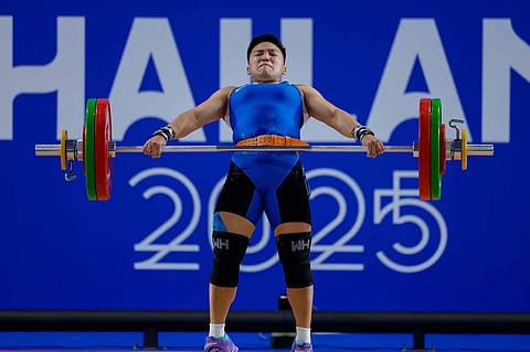 ELREEN Ando emerges as the lone gold medalist for Team Philippines in the weightlifting competition of the 33rd Southeast Asian Games.