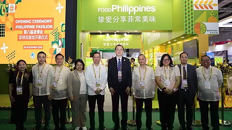 PHILIPPINE and Chinese trade officials stand together during the opening of the Philippine Pavilion at the 8th China International Import Expo 2025.