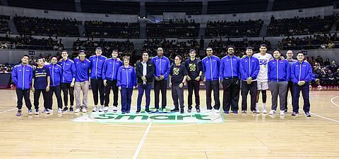 PBA commissioner Willie Marcial (center) honors head coach Norman Black and the rest of the Gilas Pilipinas team that won the gold medal in the 33rd Southeast Asian Games during a simple ceremony at the Smart Araneta Coliseum last Saturday.