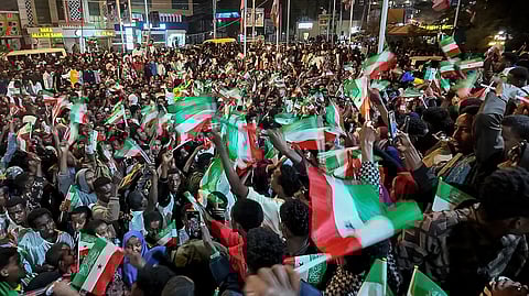 RESIDENTS wave Somaliland flags as they gather to celebrate Israel’s announcement recognizing its statehood in downtown Hargeisa, on 26 December 2025.