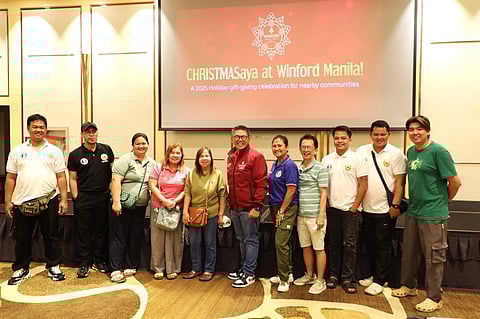 Jeffrey Evora, WRCM President & COO, together with barangay officials and community leaders