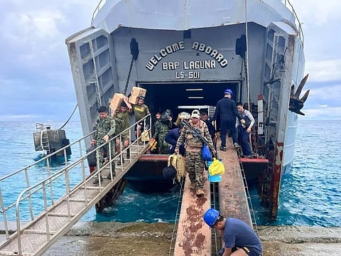 Personnel of BRP Laguna (LS501) unloads cargoes for its maritime patrol and sealift/transport mission in Palawan. (Photo from Philippine Navy)