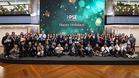PHILIPPINE Stock Exchange employees joined PSE president and CEO Ramon S. Monzon, PSE COO Atty. Roel A. Refran and PSE management officers in a group photo on the last trading day of 2025.