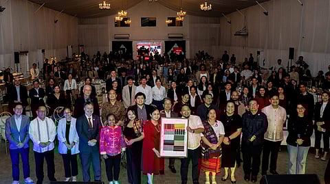 ATTENDEES of the Climate Change Commission’s Solidarity Night, including officials of PLDT and Smart, gather for a group shot to support climate change mitigation recently in Makati City.