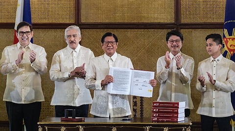 SIGNED, sealed, to be delivered Every peso will benefit the Filipino people, promised President Ferdinand R. Marcos Jr. in his speech after he signed the General Appropriations Act for Fiscal Year 2026 at the Malacañang Ceremonial Hall on Monday, 5 January. The national budget, enacted as Republic Act 12314, amounts to P6.793 trillion. The President (center) — with (from left) Acting Executive Secretary Ralph Recto, Senate President Tito Sotto, House Speaker Bojie Dy and Majority Floor Leader Rep. Sandro Marcos — said the 2026 budget reflects the government’s commitment to more prudent, careful and responsible public spending.