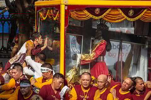 a scene from the Traslacion of the beloved Black Nazarene