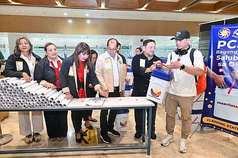 312 OFWs from Kuwait welcomed home