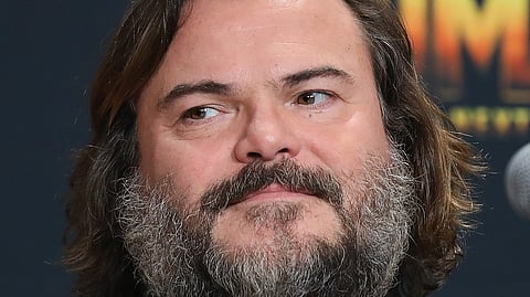 Jack Black at a promotional event. The actor recently reflected on his regret over turning down the role of Syndrome in Pixar’s The Incredibles. | Getty Images/AFP