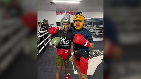 WORLD champion Pedro Taduran (left) gets quality sparring from Filipino-American featherweight Joshapat Navarro in Las Vegas.