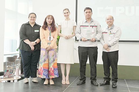 RECOGNITION is received by MMPC executives onstage during the PCX Pulse Event after the company achieved 100 percent plastic offsetting. Shown are: (2nd from right) Reynaldo Gabay, MMPC senior vice president for the Manufacturing Division, together with Marfel Ancheta, vice president for the Safety, Health, and Environment Department (1st from right), proudly received the award at the PCX Markets’ Pulse event. Presenting the award (from left) are Athalee Reyes, PCX senior manager; Engr. Maria Dorica Naz-Hipe, assistant director of the Environmental Management Bureau and Head of the National Ecology Center, and Nanette Medved-Po, founder and executive chair of PCX.