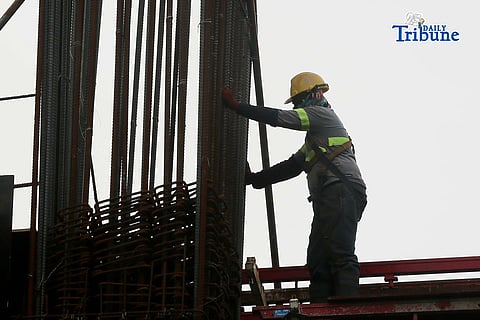 Construction workers were seen busy at the ongoing 20 storey constructed Philippine Cancer Center hospital building in Quezon City, on Tuesday, January 13, 2026