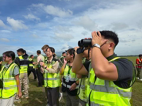 PARTICIPANTS in an airport safety training exercise.