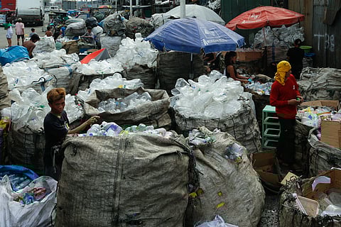 WASTE WATCH
Workers sort collected garbage, mostly plastics and recyclables, at a junk shop along Road 10 in Manila on the afternoon of 16 January 2026. The Manila city government has updated its garbage collection fees for the first time in over a decade to address rising hauling costs and increased waste volumes.