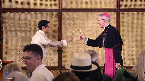 PRESIDENT Ferdinand Marcos Jr. (left) hosts the first vin d’honneur of the year at the Ceremonial Hall of Malacañang Palace with Papal Nuncio Charles John Brown (right), as ambassadors and heads of international organizations join the traditional exchange of toasts marking the New Year.