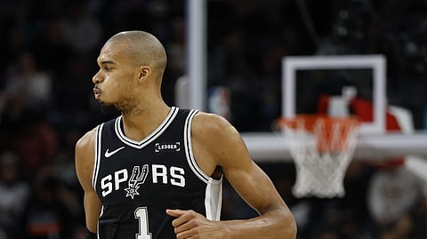 SAN ANTONIO, TX - JANUARY 17: Victor Wembanyama #1 of the San Antonio Spurs reacts after hitting a three against Minnesota Timberwolves in the first half at Frost Bank Center on January 17, 2026 in San Antonio, Texas.