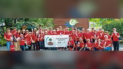 COCA-COLA Philippines employees join tree-planting activity at La Mesa Watershed.