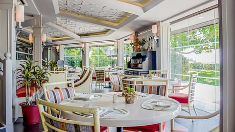 A COZY, elegant space designed for meaningful dining moments at Taza Fresh Table.