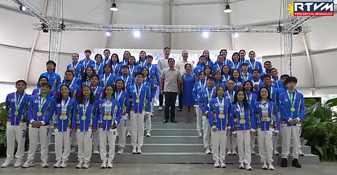 President Ferdinand Marcos Jr and First Lady Liza Araneta-Marcos join athletes during the "Parangal at Pasasalamat sa mga Bayaning Atleta: A Homecoming Celebration for the 33rd SEA Games Athletes" at the Foro de Intramuros in Manila on Wednesday.