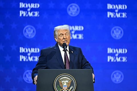 US President Donald Trump speaks at the "Board of Peace" meeting during the World Economic Forum (WEF) annual meeting in Davos on January 22, 2026. US President Donald Trump will show off his new "Board of Peace" at Davos on January 22, 2026 burnishing his claim to be a peacemaker a day after backing off his own threats against Greenland. Originally meant to oversee the rebuilding of Gaza after the war between Hamas and Israel, the board's charter does not limit its role to the Strip, and has sparked concerns that Trump wants it to rival the United Nations.
