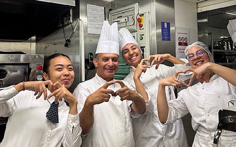 FILIPINO students engaged European hospitality traditions, showing how food and service function as everyday instruments of cultural diplomacy.