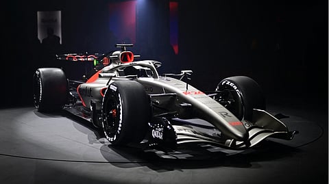 AUDI’s R26 Formula One car is revealed under the lights, showing the brand’s first single-seater ahead of its 2026 grid debut.