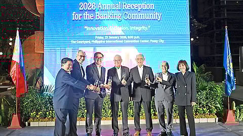 BANGKO Sentral ng Pilipinas Governor Eli Remolona Jr. (center) leads the ceremonial toast for the BSP's annual reception for the banking community at the Philippine International Convention Center on 23 January. Remolona highlighted the theme ‘Innovation, Inclusion, Integrity,’ emphasizing that these are vital not only to economic growth but also to financial stability. He also called for continued collaboration to strengthen trust in the financial system. With the Governor in the photo are Monetary Board Members (from left) Jose Querubin, Walter Wassmer, Frederick Go, Benjamin Diokno, Romeo Bernardo and Rosalia de Leon.